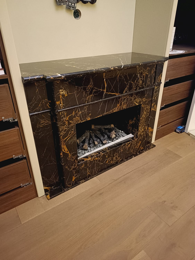 фото:Камин из мрамора Нью Порторо