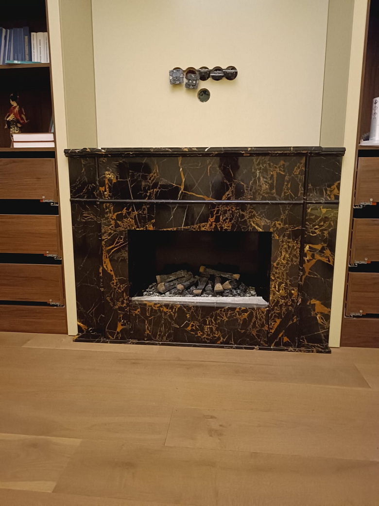 фото:Камин из мрамора Нью Порторо