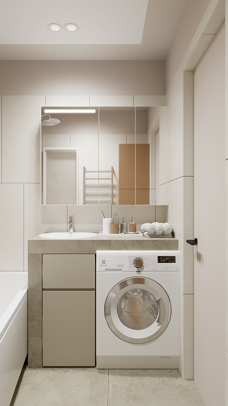 фото:Для этой ванной комнаты мы выбрали компактный вариант акриловой ванны бренда RAVAK, у них есть особенная модель, которая заужена в зоне ног. Такая конфигурации ванны позволила нам разместить раковину и стиральную машинку в одну линию, организовав общую столешницу, выполненную в строительном исполнении. Обращаю внимание, что в таком исполнении столешница получается выше нормы, но хозяева приняли решения что им это не помеха