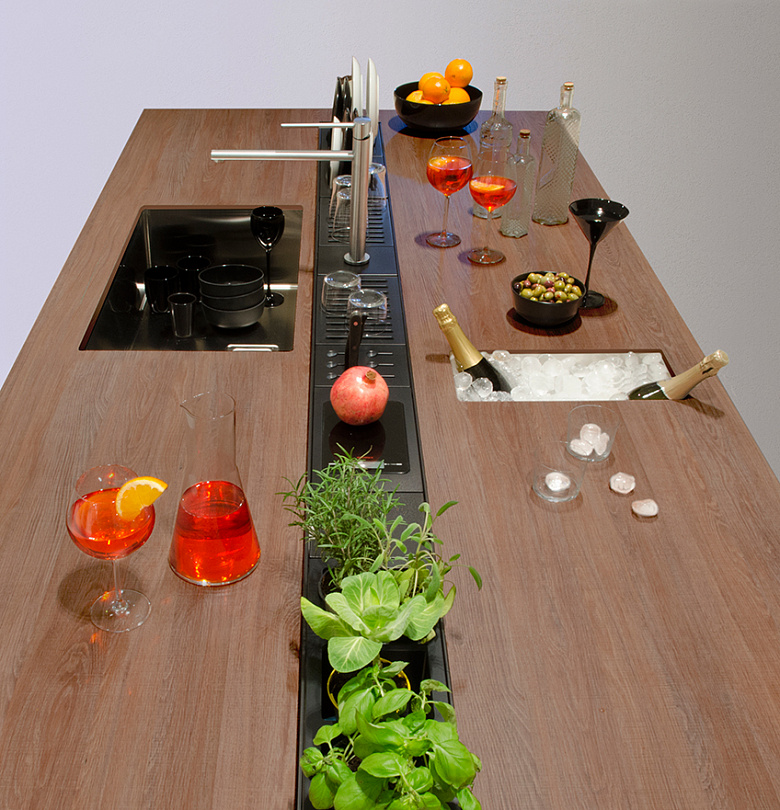 фото:Альтернатива настольным - сушилки, встроенные в стол или даже в кухонный остров. Domusomnia